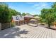Spacious wooden deck overlooks the backyard with lovely fire pit area and a nice lawn at 2903 Ashebrooke Ne Dr, Marietta, GA 30068