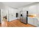 Well-lit kitchen boasting ample white cabinetry, stainless steel appliances, and an open layout at 2903 Ashebrooke Ne Dr, Marietta, GA 30068
