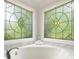 Close up of stained glass window over bathtub at 2903 Ashebrooke Ne Dr, Marietta, GA 30068