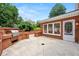 Built-in outdoor kitchen with grill offers an ideal space for outdoor dining and entertaining at 2903 Ashebrooke Ne Dr, Marietta, GA 30068