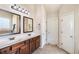 Bathroom with double sinks, and ample cabinet space at 7946 White Oak Loop, Stonecrest, GA 30038