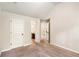View of hall area leading to stairs, bedroom and bath at 7946 White Oak Loop, Stonecrest, GA 30038