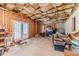 Unfinished basement with exposed beams and a walkout to the backyard at 1022 Nestling Dr, Lawrenceville, GA 30045
