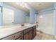 Bathroom featuring a large vanity, toilet, and shower-tub, perfect for Gathering use at 1022 Nestling Dr, Lawrenceville, GA 30045