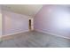 Bedroom with vaulted ceiling, perfect for customization and relaxation at 1022 Nestling Dr, Lawrenceville, GA 30045
