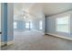 Spacious bonus room with vaulted ceiling, multiple windows, and neutral carpeting, offering versatility at 1022 Nestling Dr, Lawrenceville, GA 30045
