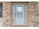 Welcoming front door with glass pane and sidelights at 1022 Nestling Dr, Lawrenceville, GA 30045