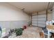 Spacious garage with concrete flooring and a roll-up door at 1022 Nestling Dr, Lawrenceville, GA 30045