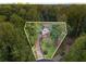 Aerial view of updated home on private wooded lot at 2552 Hunton Ne Ct, Marietta, GA 30068