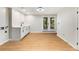 Finished basement featuring vinyl floors, utility sink, and bright white cabinets at 2552 Hunton Ne Ct, Marietta, GA 30068