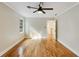 Bedroom with hardwood floors, natural light from the window, and ceiling fan at 2552 Hunton Ne Ct, Marietta, GA 30068