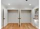 Walk-in closet with double doors and shelving, maximizing storage space for organized living at 2552 Hunton Ne Ct, Marietta, GA 30068