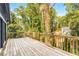 Elevated wooden deck offering serene treetop views, ideal for enjoying nature and tranquility at 2552 Hunton Ne Ct, Marietta, GA 30068