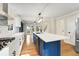 Bright and modern kitchen featuring a center island, stainless steel appliances, and elegant finishes throughout at 2552 Hunton Ne Ct, Marietta, GA 30068