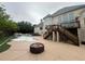 Luxury backyard with a pool, fire pit, and elevated deck at 2609 Jacobs Crest Cv, Grayson, GA 30017