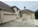 Three car garage with ample parking space and brick exterior at 2609 Jacobs Crest Cv, Grayson, GA 30017