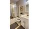 Bathroom with shower, toilet, and sink vanity with white cabinetry at 4221 Riverlake Way, Snellville, GA 30039