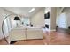 Spacious living room with a large sectional couch, fireplace, lots of natural light, and a skylight at 4221 Riverlake Way, Snellville, GA 30039
