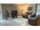 Cozy living area features a comfortable seating arrangement, neutral colors and lots of light at 4221 Riverlake Way, Snellville, GA 30039