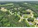 An aerial shot of this neighborhood shows mature landscaping, well manicured lawns and quiet cul-de-sac streets at 232 Christian Cir, Carrollton, GA 30116