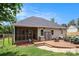 Relax and enjoy the expansive wooden deck in the backyard, perfect for outdoor entertainment and relaxation at 232 Christian Cir, Carrollton, GA 30116