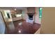 Cozy living room featuring fireplace, built-in shelves, and hardwood floors at 2600 Amberly Dr, Dunwoody, GA 30360