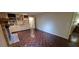 Bright living room with fireplace, built-in shelves, and hardwood parquet flooring at 2600 Amberly Dr, Dunwoody, GA 30360
