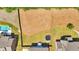 An aerial view of the backyard with a patio, adjacent to a pool with clear fencing at 2953 Balvenie Pl, Acworth, GA 30101
