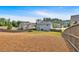 Expansive backyard view featuring mature trees and well-maintained greenery, offering ample space and privacy at 2953 Balvenie Pl, Acworth, GA 30101