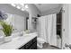 Clean bathroom with white countertop, modern fixtures, and a combined shower and tub at 2953 Balvenie Pl, Acworth, GA 30101