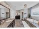 Bright bathroom features a soaking tub, glass enclosed shower, dual sink vanity, and tile flooring at 2953 Balvenie Pl, Acworth, GA 30101