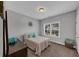 Relaxing bedroom with natural light and minimalist decor, creating a tranquil atmosphere at 2953 Balvenie Pl, Acworth, GA 30101