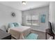 Bright bedroom features natural light, cozy bedding, and a comfortable space to relax and unwind at 2953 Balvenie Pl, Acworth, GA 30101
