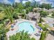 Community pool features lounge seating, picnic tables, splash fountain and covered area at 2953 Balvenie Pl, Acworth, GA 30101