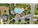 A high shot of the community pool, surrounded by seating, landscaping and a play area at 2953 Balvenie Pl, Acworth, GA 30101