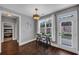 Cozy dining area with hardwood floors, view of backyard, and natural light, a peaceful setting at 2953 Balvenie Pl, Acworth, GA 30101