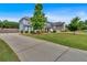 Gorgeous two-story home complete with a three car garage, long driveway, and meticulously maintained landscaping at 2953 Balvenie Pl, Acworth, GA 30101