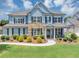 Charming two-story home with stone accents, manicured lawn, and classic curb appeal at 2953 Balvenie Pl, Acworth, GA 30101
