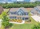 Beautiful two-story home with lush landscaping, a welcoming front porch, and a well-manicured lawn at 2953 Balvenie Pl, Acworth, GA 30101
