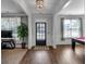 Inviting entrance way, showcasing hardwood flooring, sophisticated decor and an open transition to other rooms at 2953 Balvenie Pl, Acworth, GA 30101