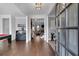 Spacious foyer features hardwood flooring, elegant lighting, and an open view of the home's interior at 2953 Balvenie Pl, Acworth, GA 30101