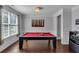 Entertaining game room featuring a classic billiards table, stylish decor, and a bright, inviting atmosphere at 2953 Balvenie Pl, Acworth, GA 30101
