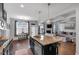 Spacious kitchen featuring an island, stainless steel appliances, and an open floorplan at 2953 Balvenie Pl, Acworth, GA 30101