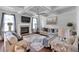 Bright and airy living room features coffered ceilings, fireplace, and plush seating at 2953 Balvenie Pl, Acworth, GA 30101