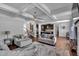 Open living space with coffered ceiling transitions to a modern, well-appointed kitchen at 2953 Balvenie Pl, Acworth, GA 30101