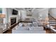Cozy living room with fireplace, large sectional sofa, and decorative ceiling, great space at 2953 Balvenie Pl, Acworth, GA 30101