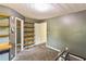 Gray bedroom with custom-built shelving and space for storage or personalized design at 433 Pearl St, Locust Grove, GA 30248