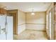 Cozy dining room features wainscoting and space for entertaining at 433 Pearl St, Locust Grove, GA 30248