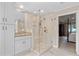 Bathroom with walk-in shower, granite vanity, and linen closet at 5049 Lake Ter, Marietta, GA 30068