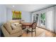Cozy dining area with natural light, seating, and access to the outdoor deck at 5049 Lake Ter, Marietta, GA 30068